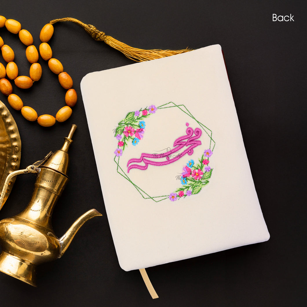 The Holy Quran With A Name & Flower Border In The Back